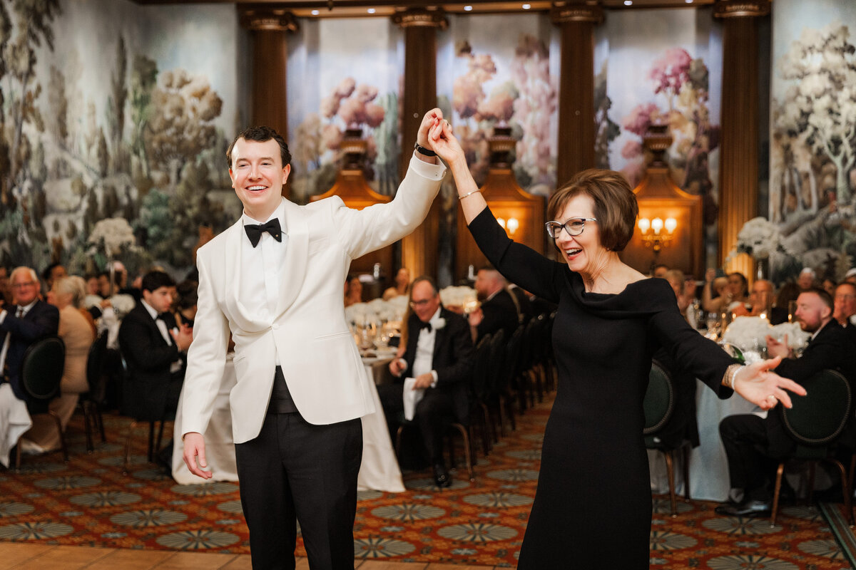 mother son celebrating their dance together