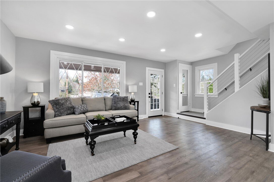 Professionally staged living room designed to maximize home value and buyer appeal
