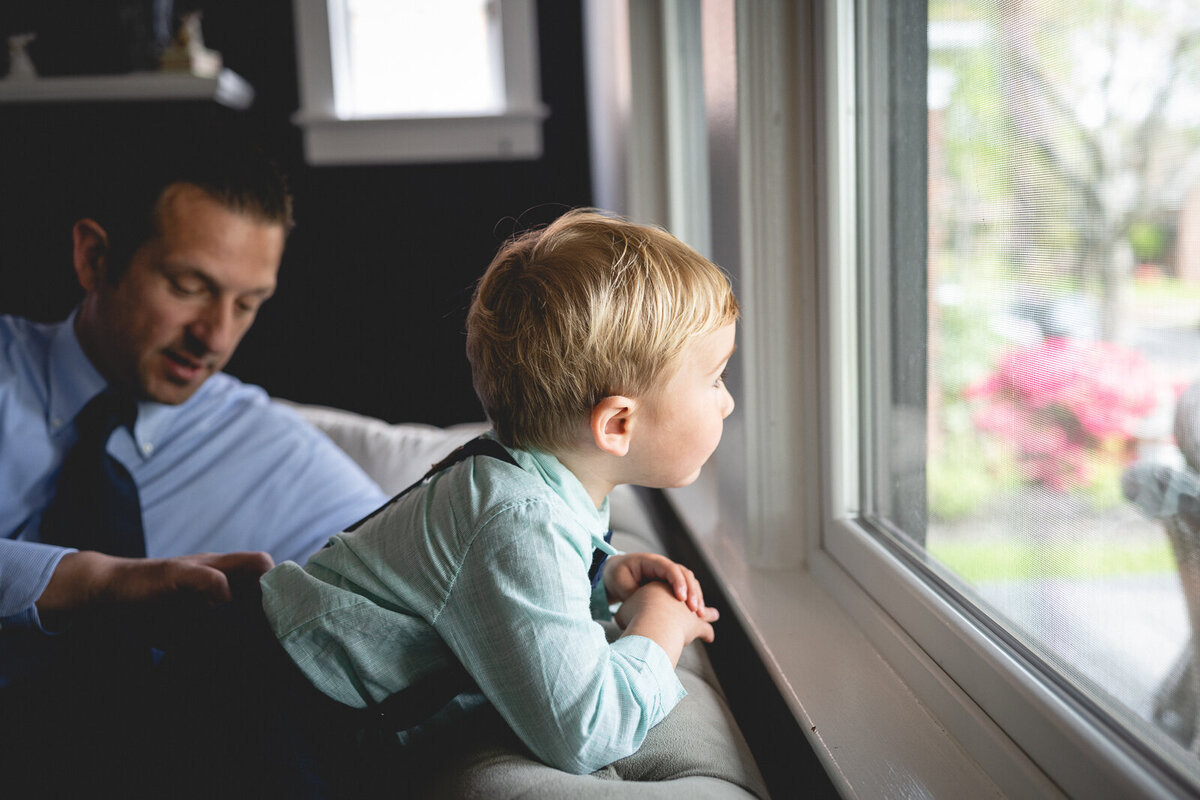 father and son on couch