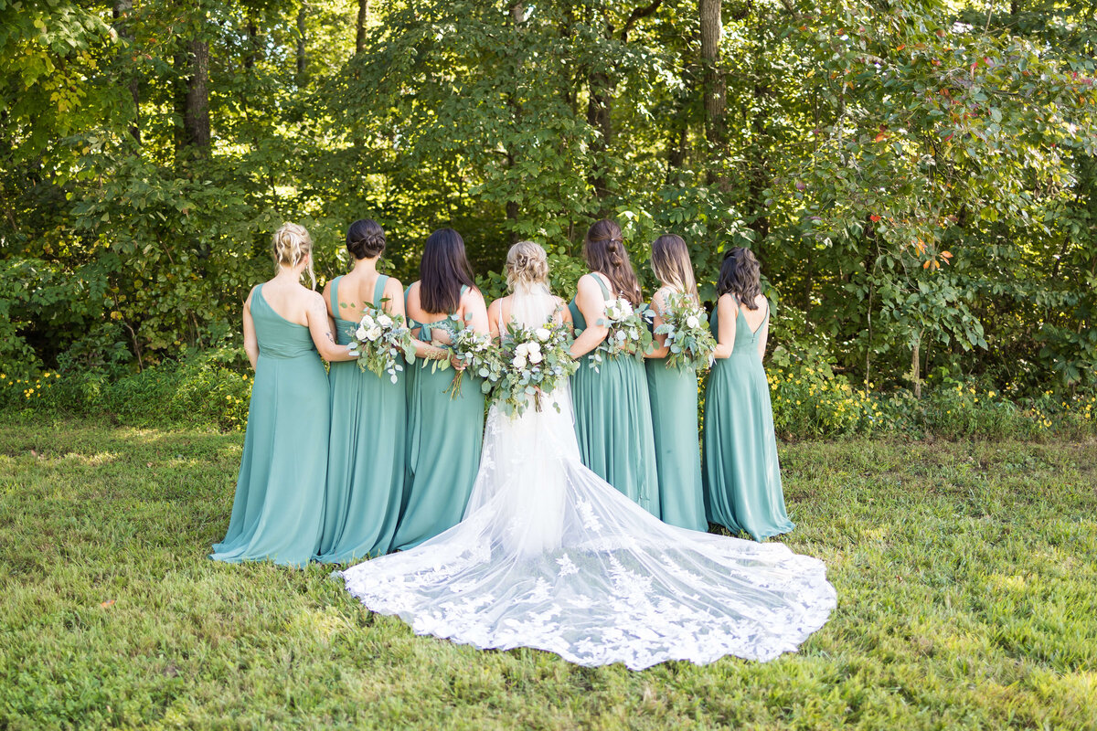 Bride with bridesmaids at  The Barn at White Oaks, Murray, Kentucky