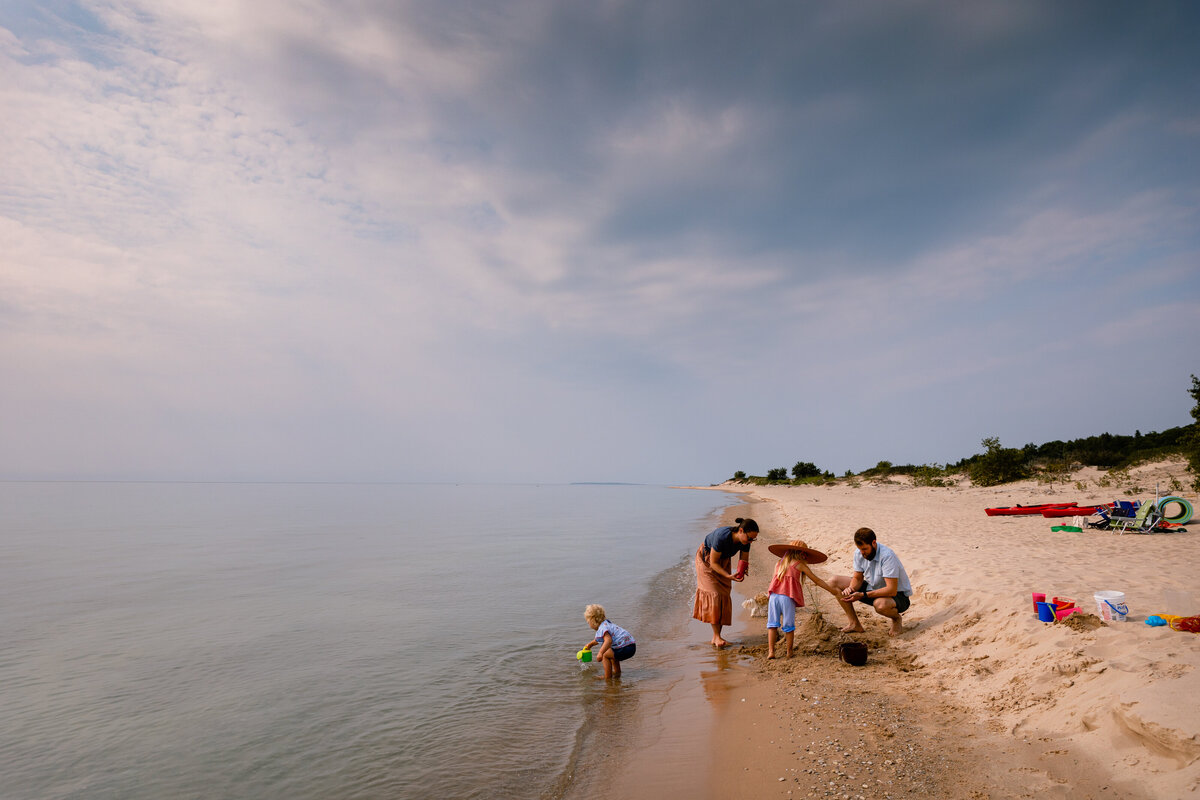 family-playing-beaver-island-beach