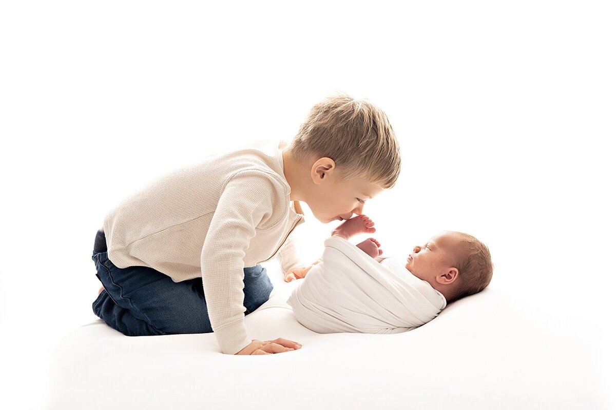 Big Brother and newborn baby
