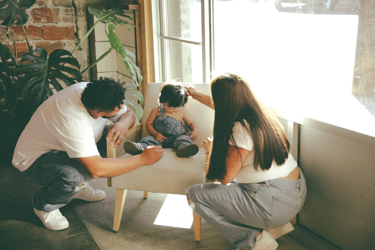 Natural Light Family Lifestyle Session with Parents and Baby in Cozy Studio