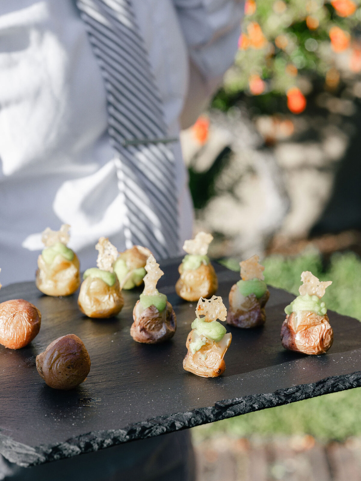 paula le duc (PLD) catering serving wedding hors d'oeuvres and appetizers to northern california wedding guests using custom and unique food presentation