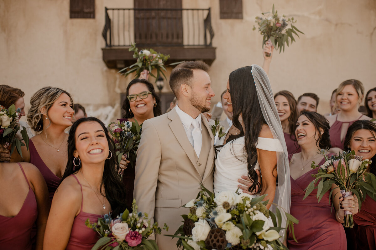 Elegant Bella Terre Vineyard wedding near Omaha, NE, blending luxury and rustic charm. Bride and groom celebrate amidst picturesque vineyard views and timeless architecture, captured by Tori Nichole Photography. A stunning setting for couples seeking a unique and sophisticated venue in the Omaha and Iowa region.