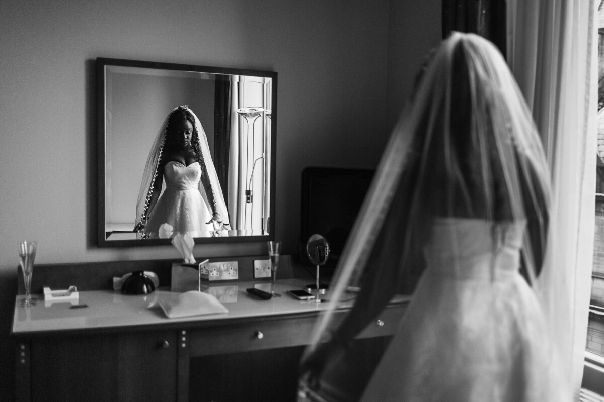 Candid Reflection of a bride during bride prep