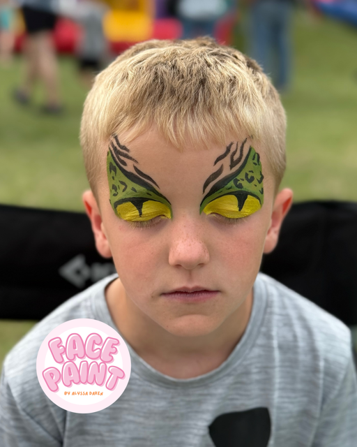 face-painting-by-alyssa-daken-boys-green-lizard-eyes-dragon-face-paint-design