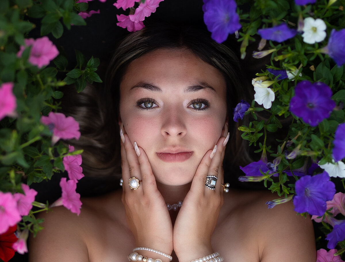 girl in greenhouse for her senior pictures Amarillo tx