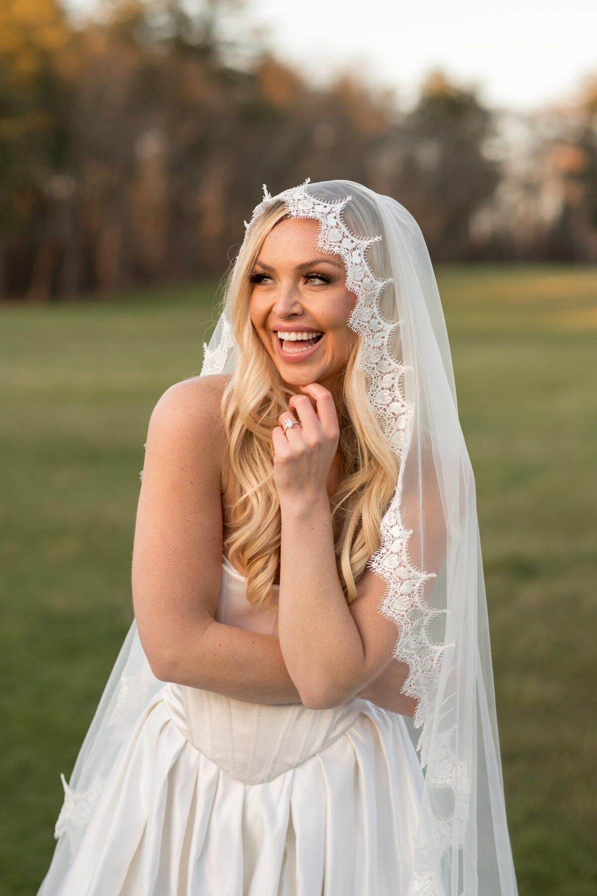 Close-up of floral lace appliqué on mantilla veil border