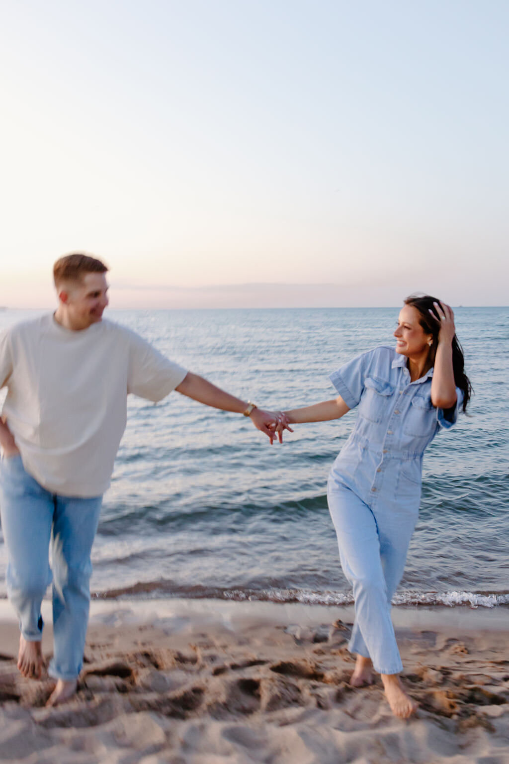 An engagement photography session at The Wrigley Building and North Ave Beach in Chicago, Illinois - 35