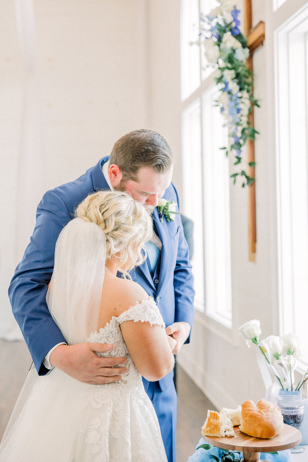 Bride and Groom taking communion during their ceremony