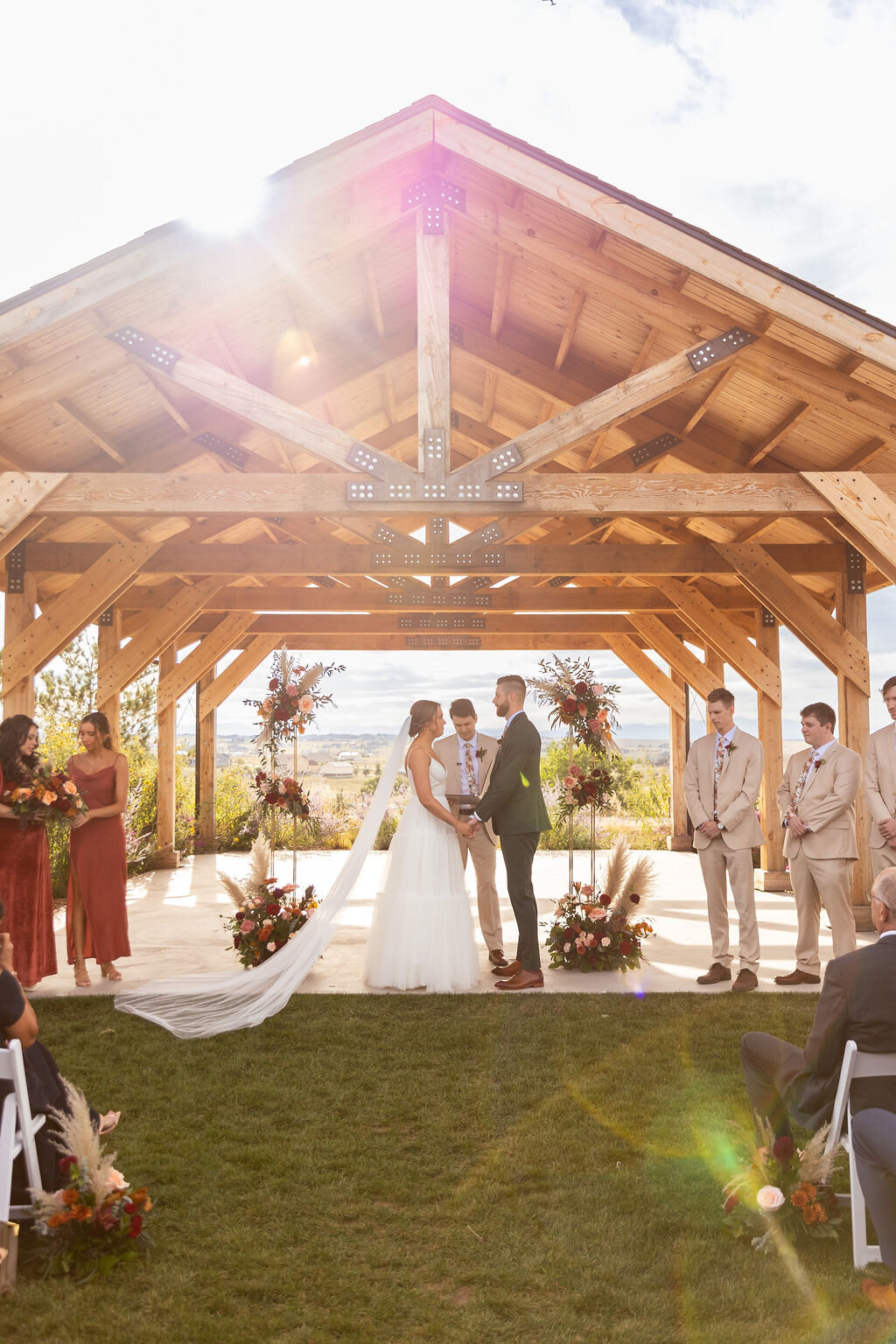 Bride and groom during their wedding ceremony at Bonnie Blues Event Venue.