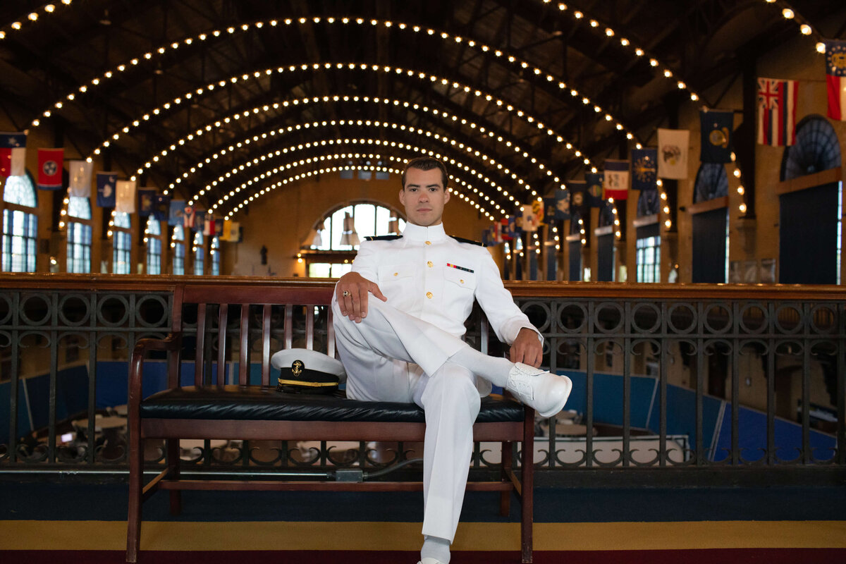 Senior Photo of Sailor in Whites in Dahlgren Hall at the Naval Academy in Annapolis, Md.