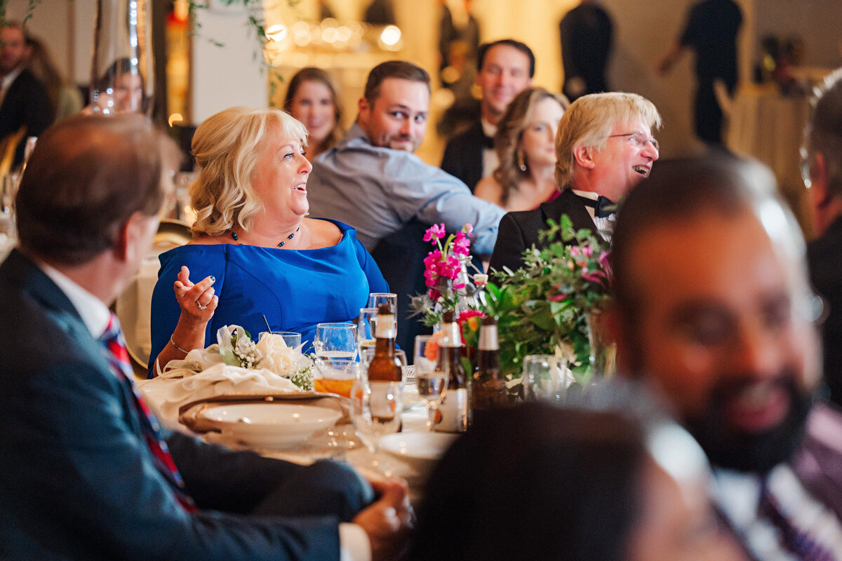 guests listening and laughting at speeches at the lake club of ohio