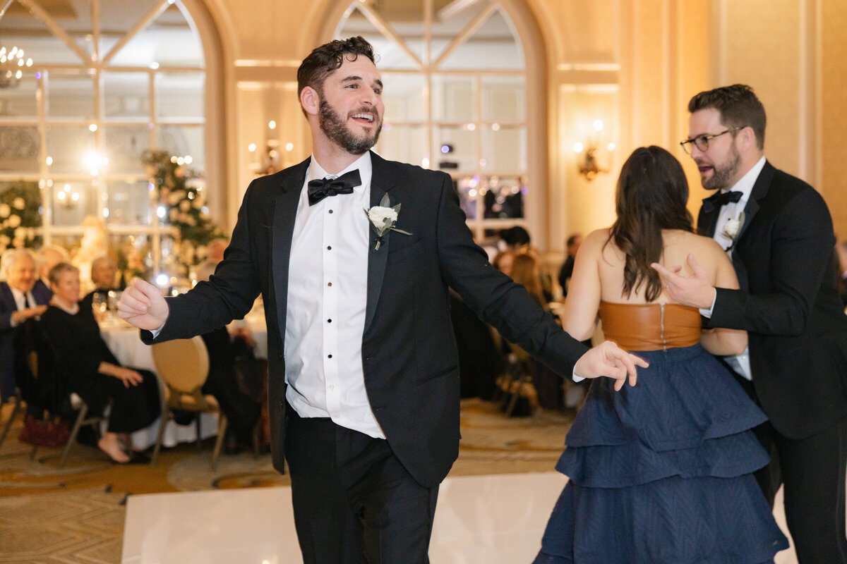 candid moment of a guest dancing atThe Adolphus in Dallas