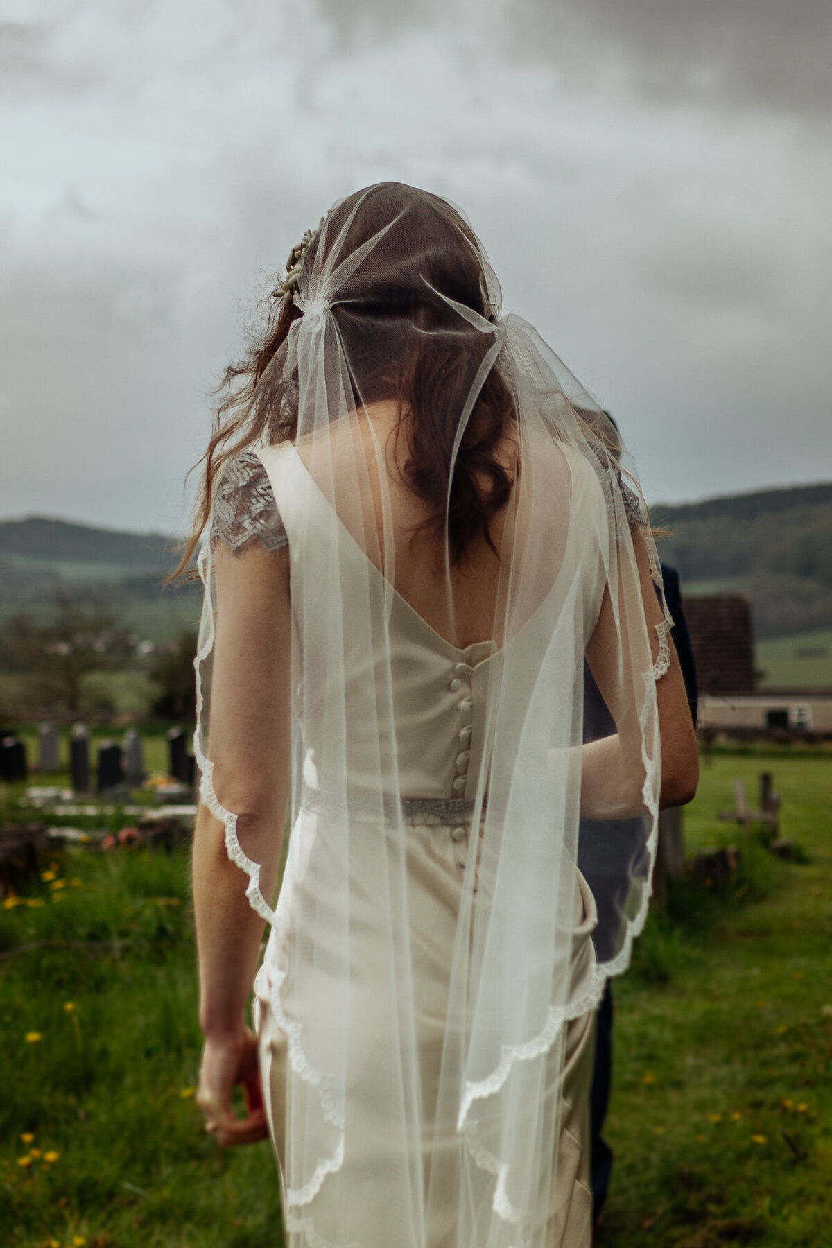 bride wedding dress detail of veil and back