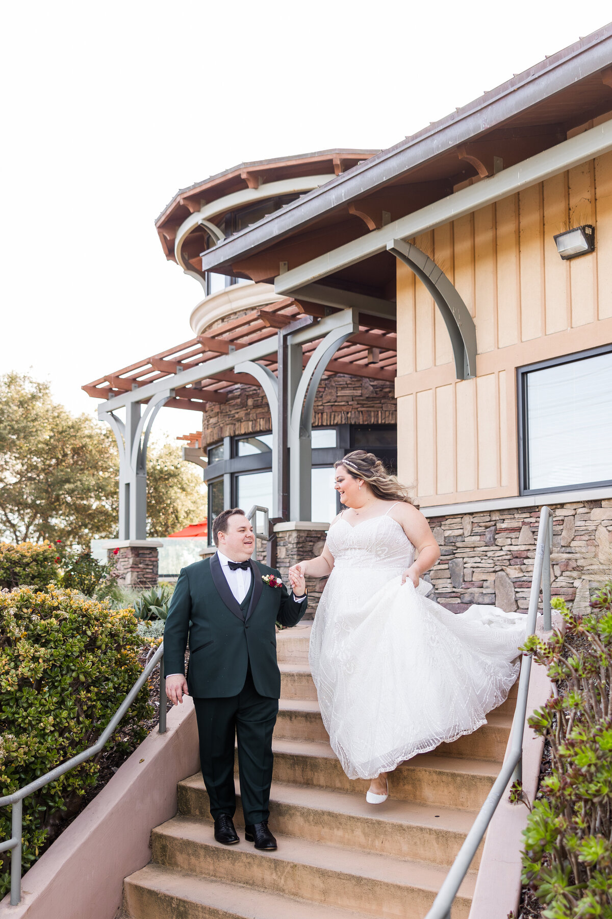 groom-leading-bride-down-stairs
