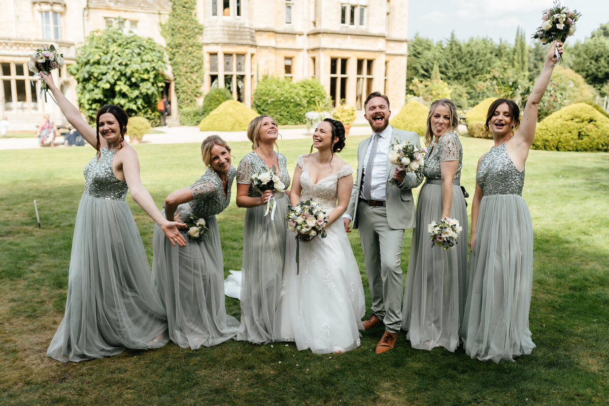 Bridemaids-Having-Fun-Holding-Boquets