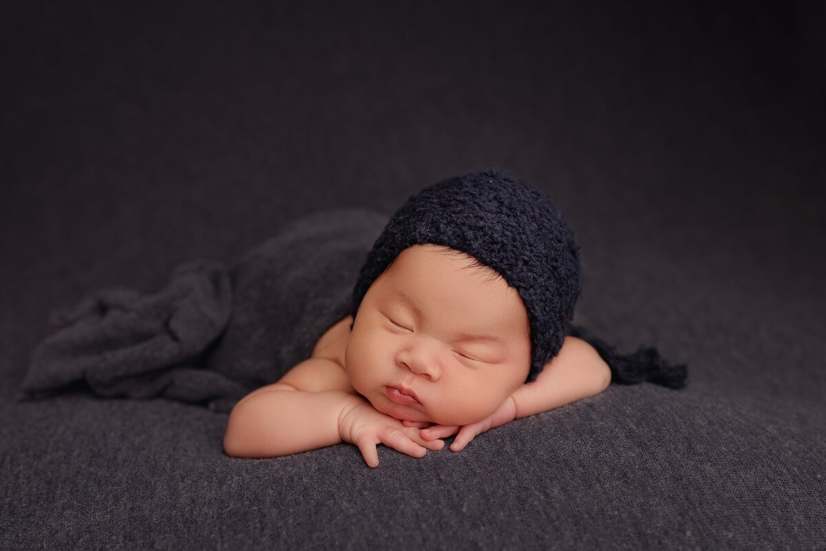 Beautiful newborn portraits in Elk Grove and Sacramento, capturing your baby's precious moments with simple elegance. Book your session today