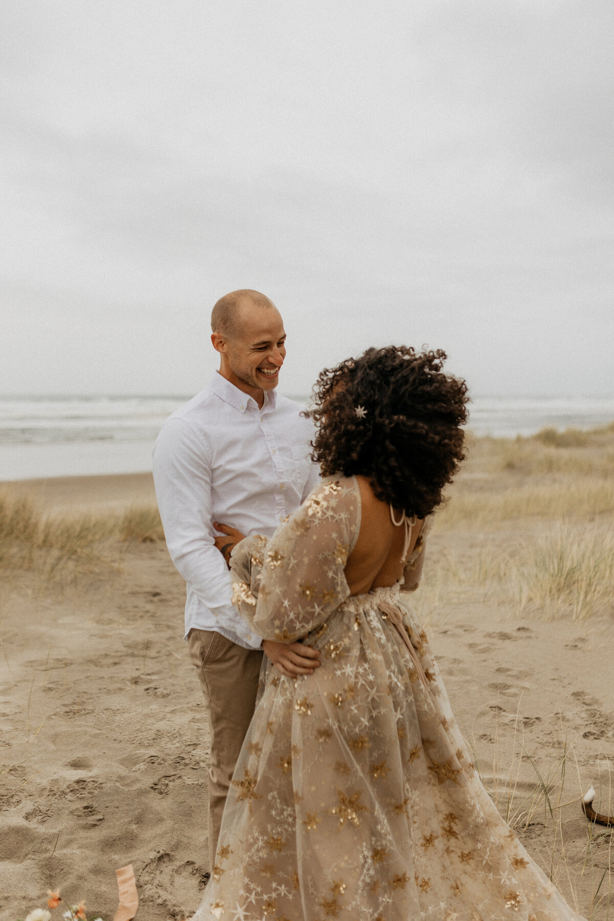 bride and groom during elopement on oregon coast