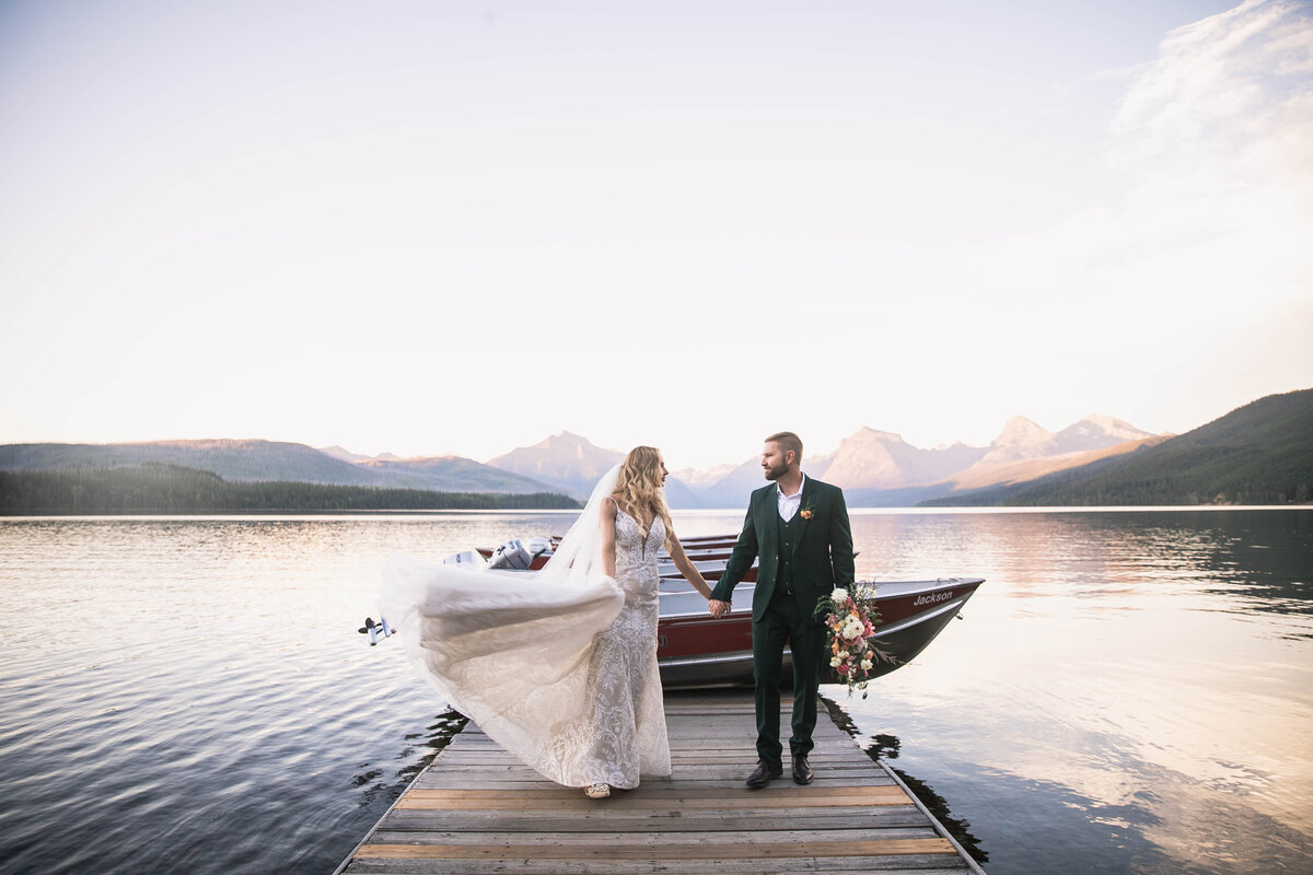 bride and groom holding hands