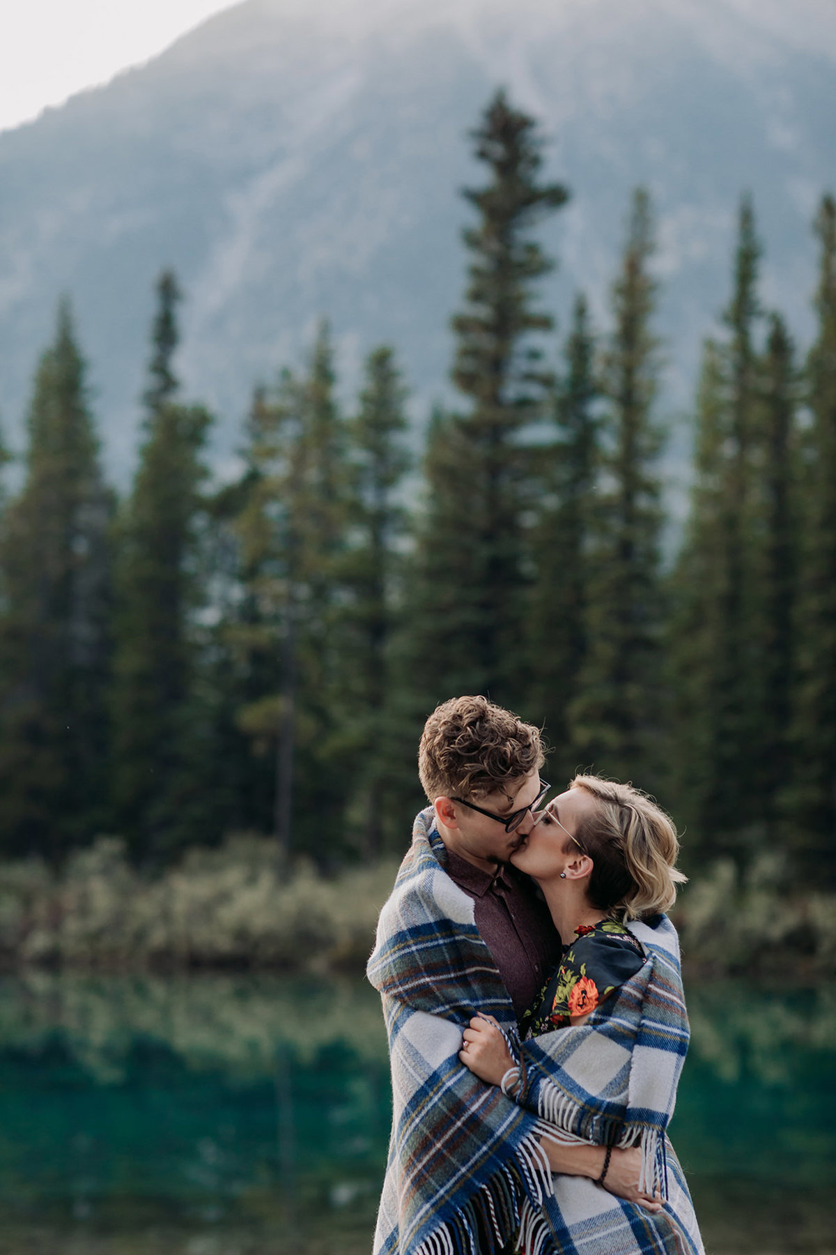 mt lorette ponds kananaskis autumn couples engagement photos blanket snuggles