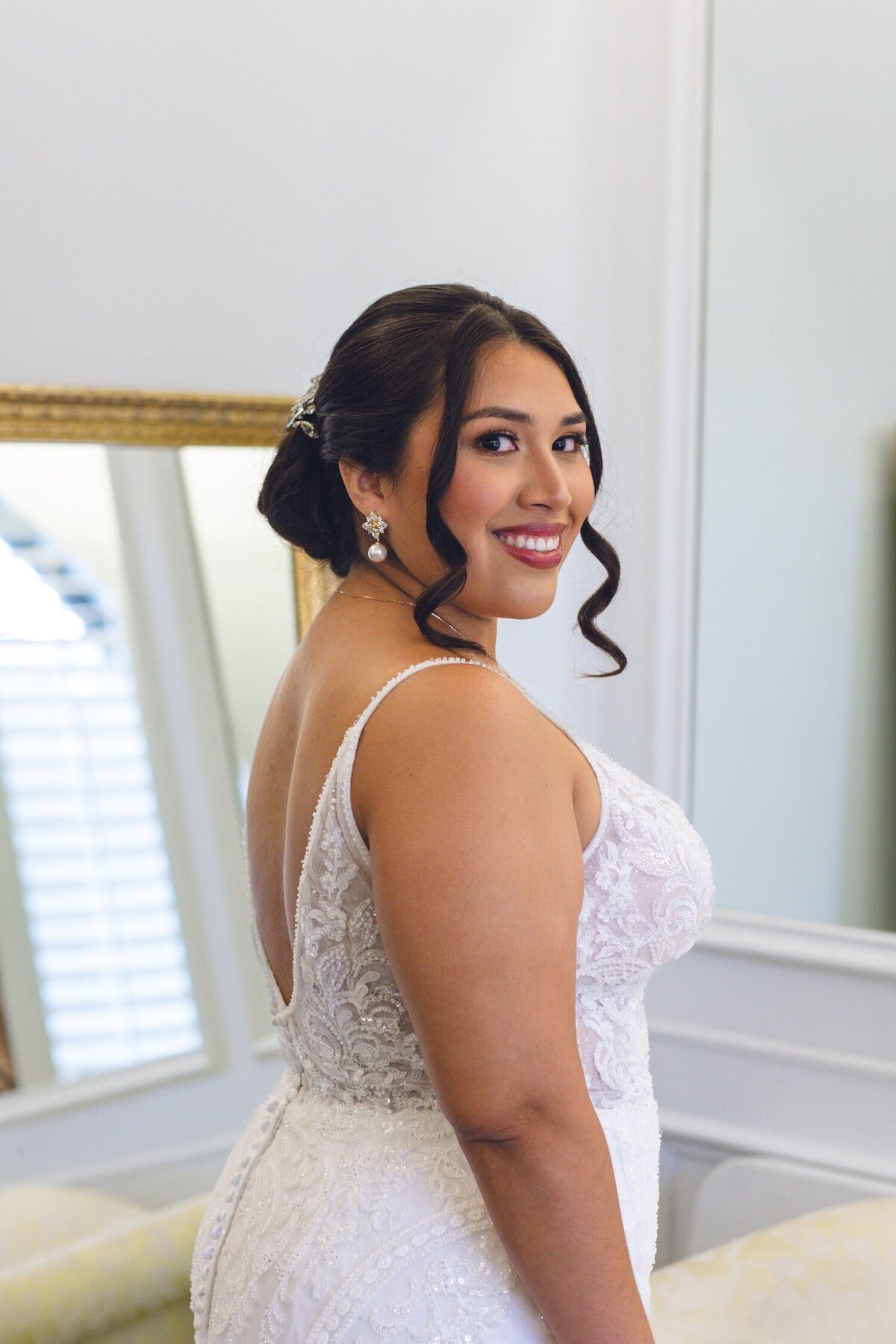 Bride smiling during wedding morning preparations