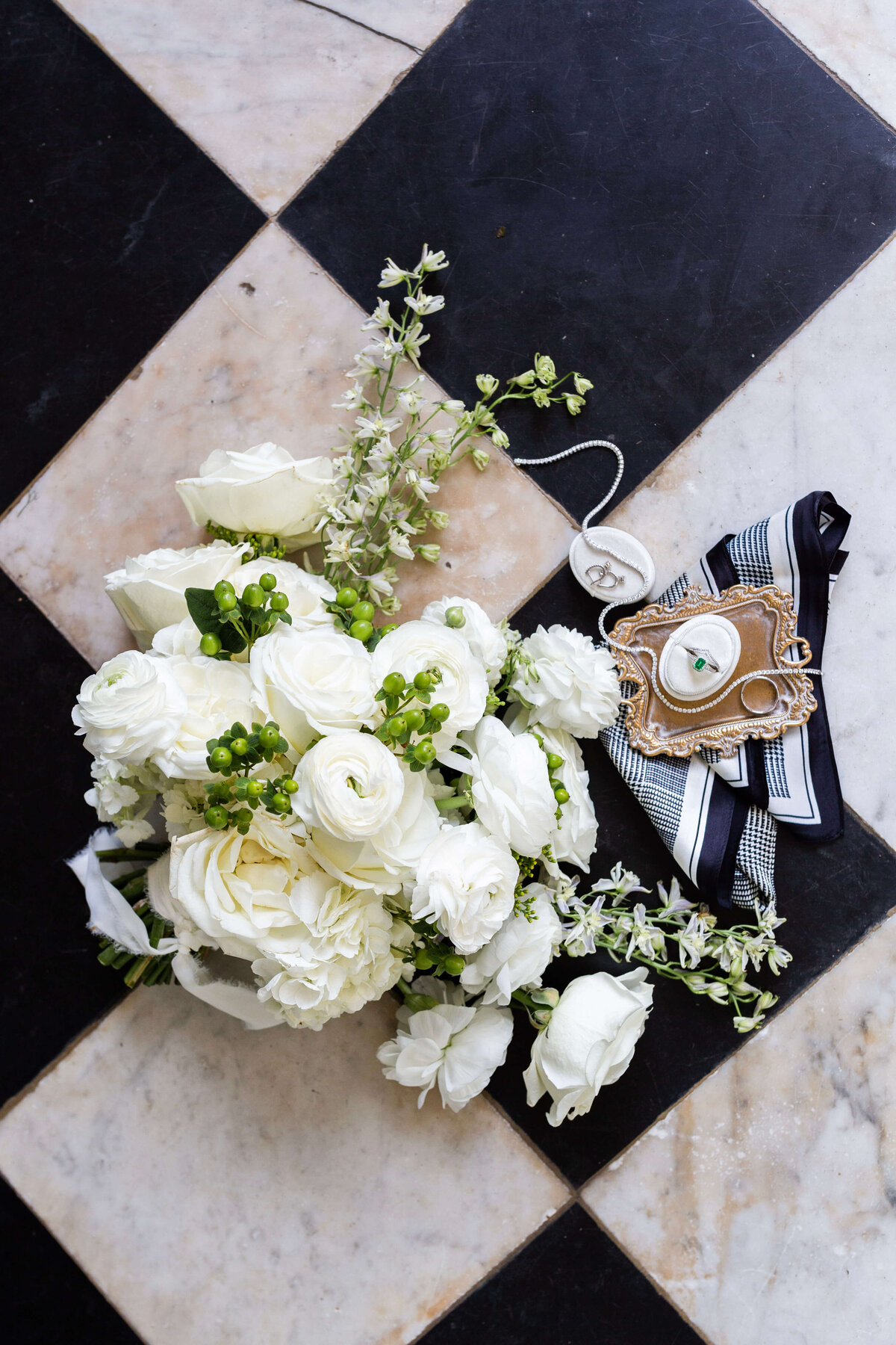 wedding details including florals and rings