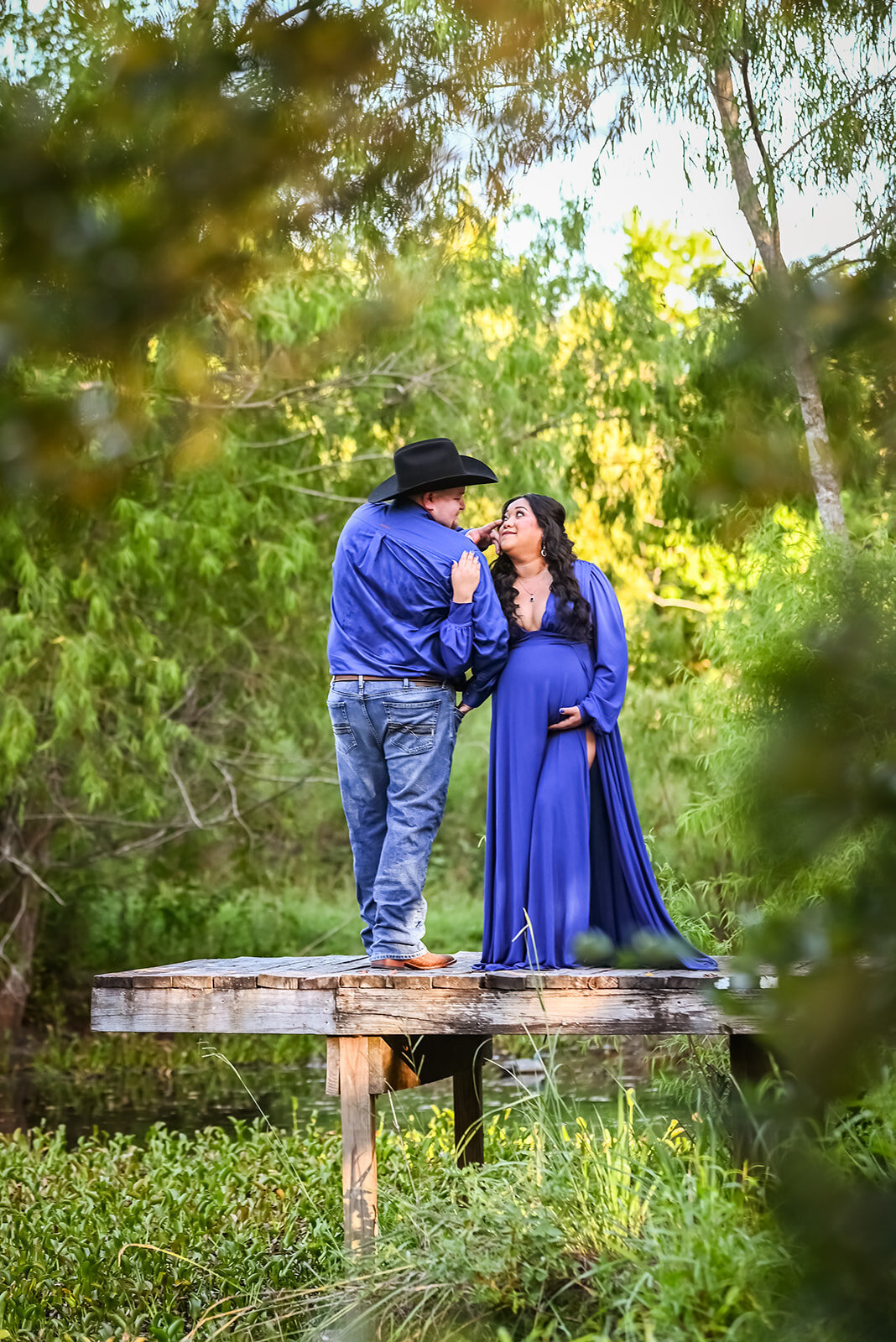 Couple - Maternity photoshoot on dock  Natasha Snyder PHotography in Santa Fe Texas