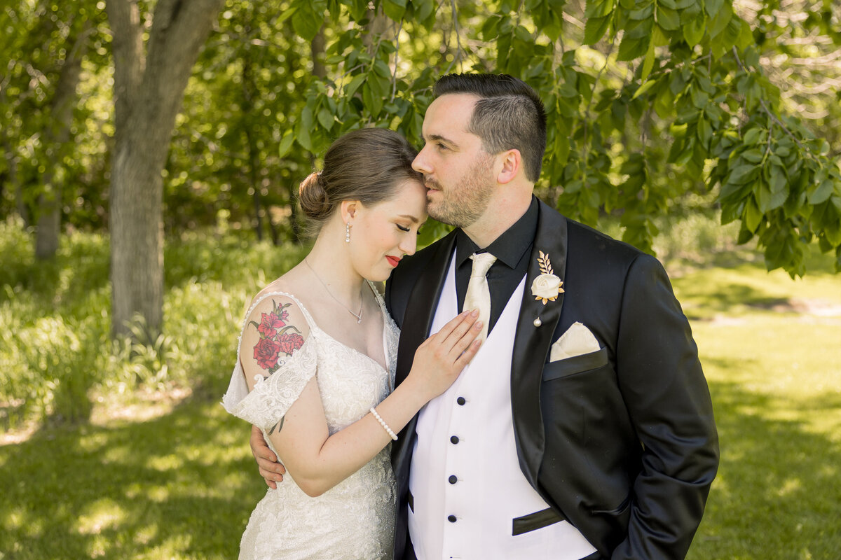 Bride and groom couple portraits in Alexandria MN on wedding day