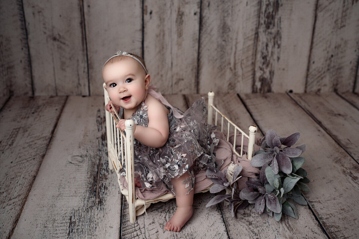 Baby girl in purple flower dress six months old by for the love of photography brighton