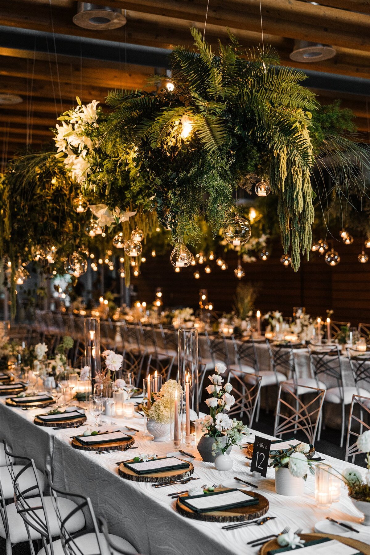 Dramatic-Ceiling-Greenery-Candle-Light-Wedding-Flora-Nova-Design-Seattle-00041