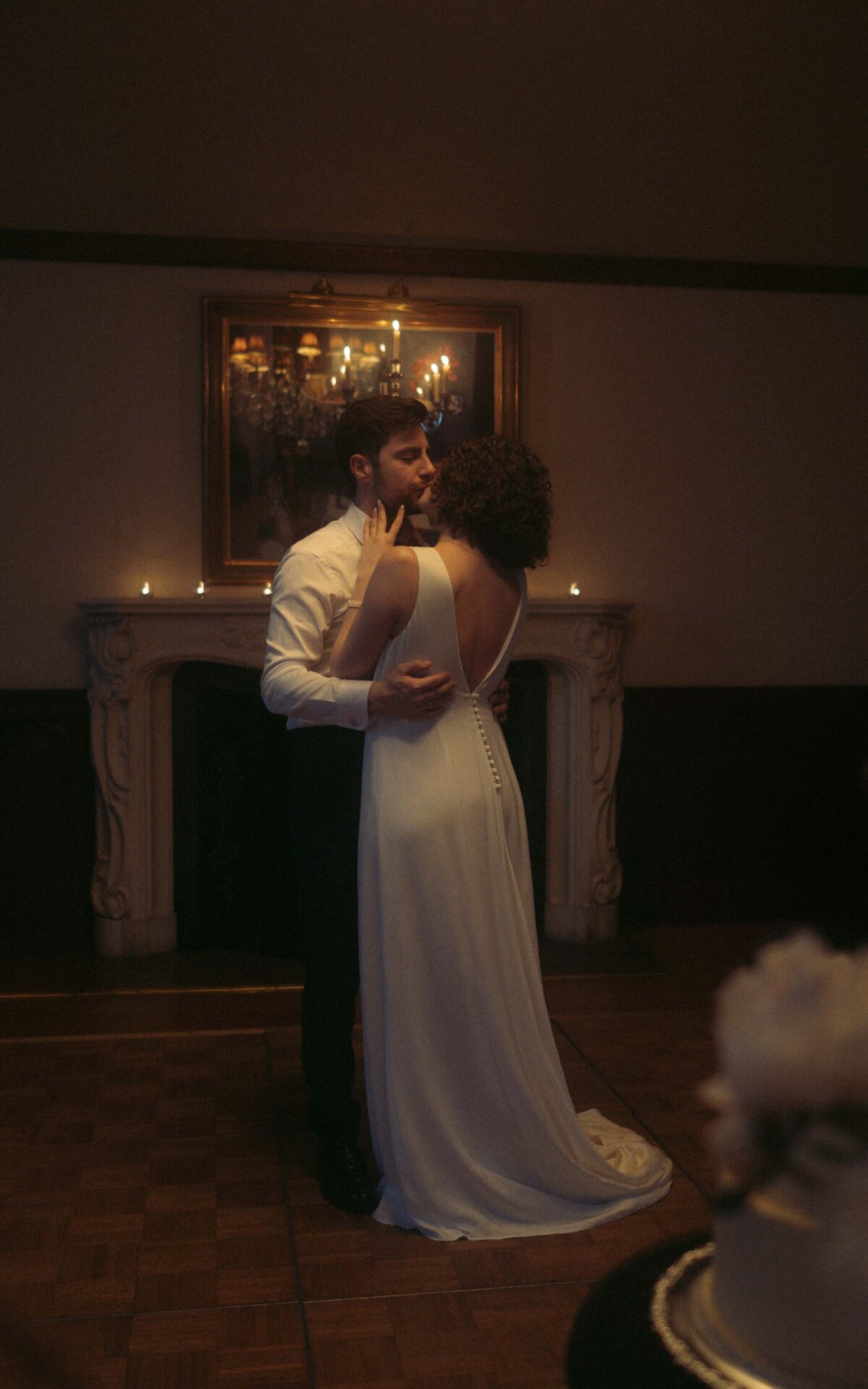 A joyous celebration as the newlyweds share their first dance at the wedding reception, surrounded by love, laughter, and unforgettable memories