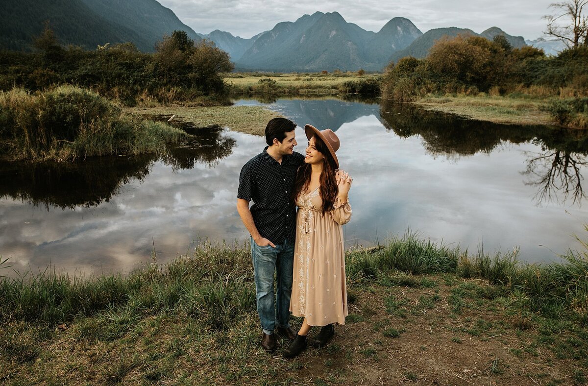 couple in front of lake