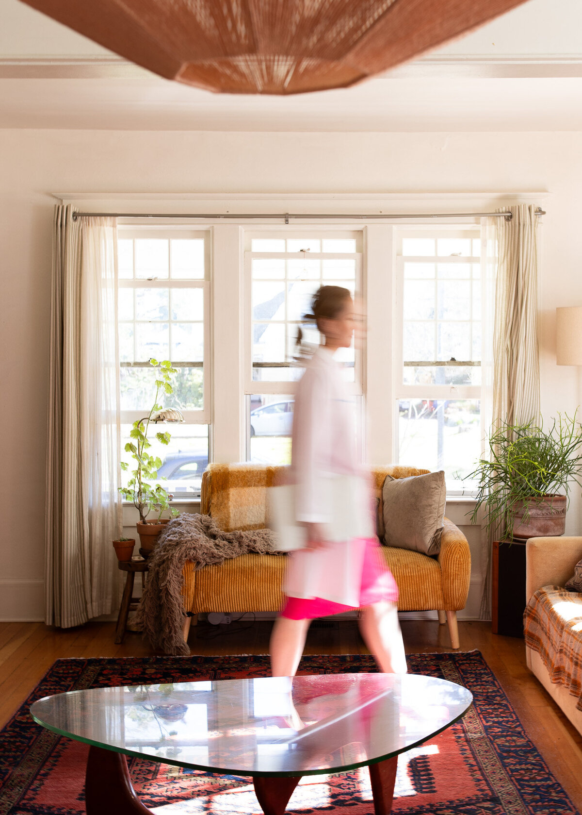 A healthcare provider walks into her waiting area during a photoshoot with a Portland branding photographer. 
