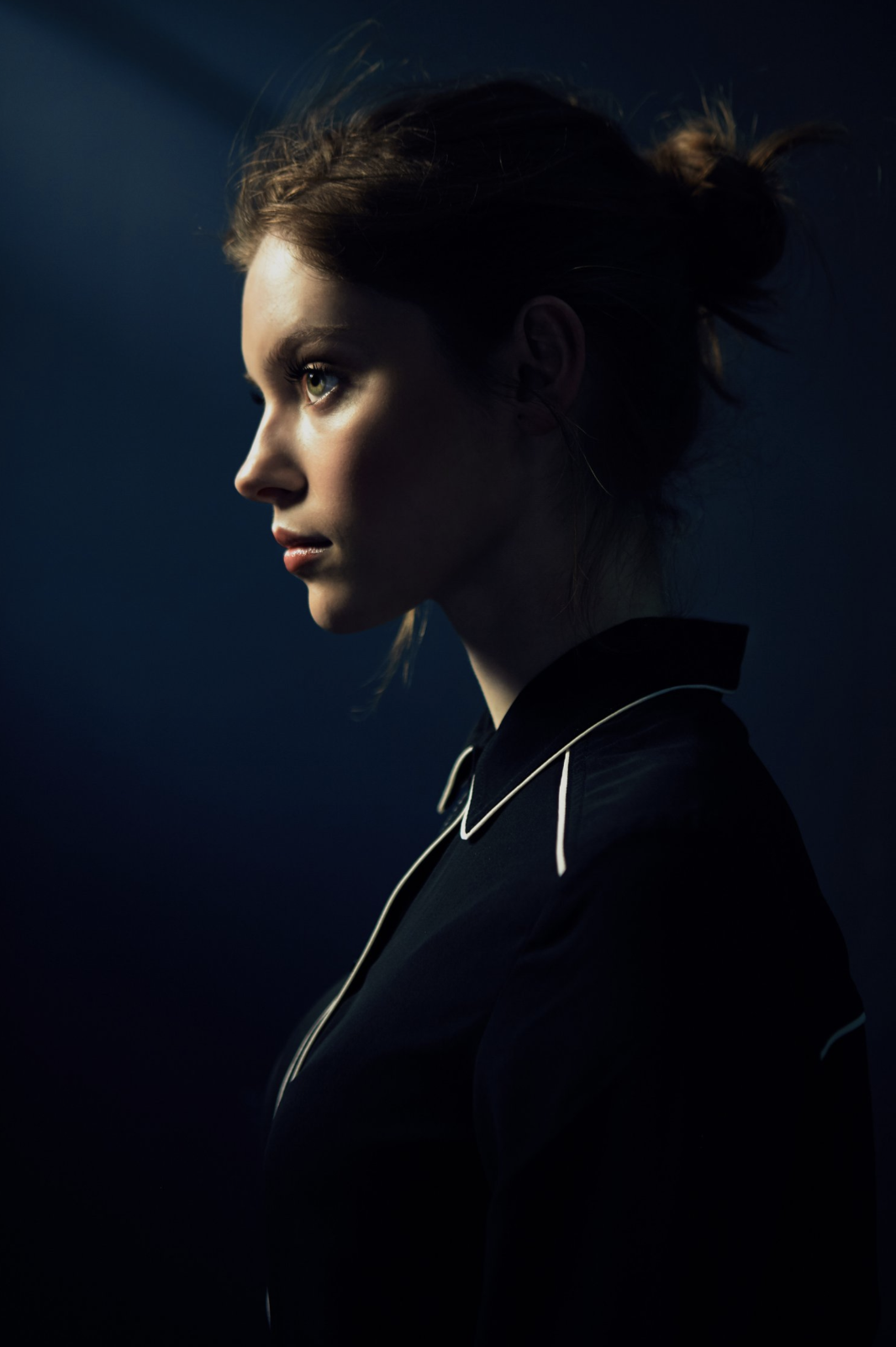 Bold framing and intentional lensing in a drama film scene.