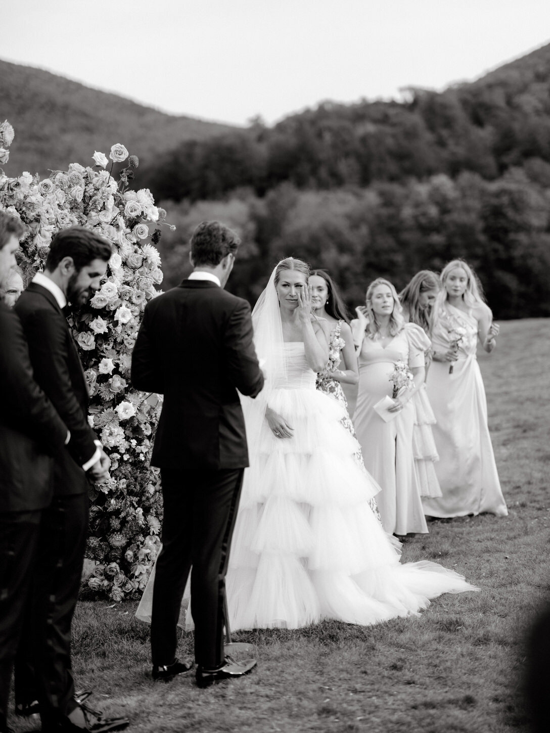 adirondack-mountain-wedding-25-black-and-white-of-couple-exchanging-vows-amidst-the-mountains-at-adirondack-mountain-wedding-jenny-fu-studio