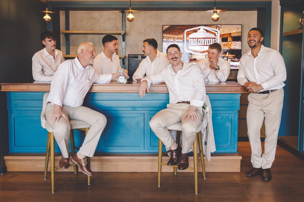 Groomsmen in lobby bar at Hyatt Ziva Cancun wedding