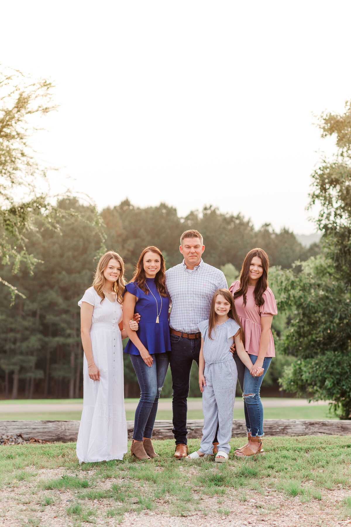 beautifully dressed family with three daughters