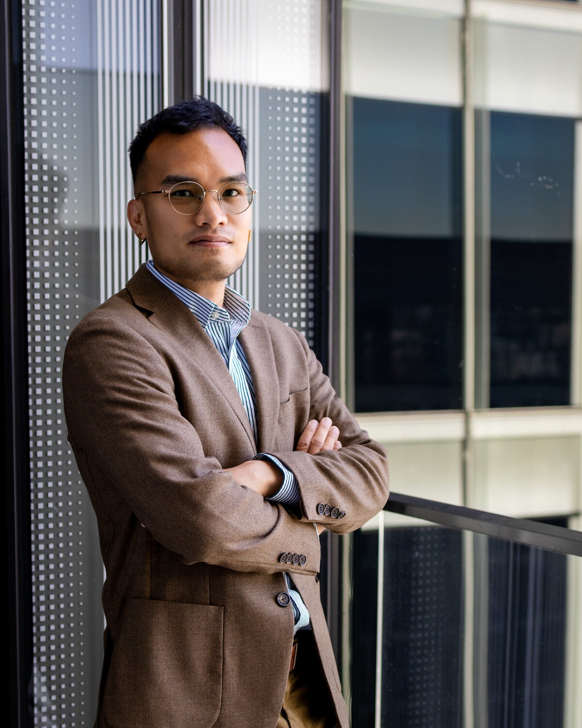 Man in brown blazer and glasses posing for professional portrait – Bay Area Headshot Portfolio – Ellobelle Photography