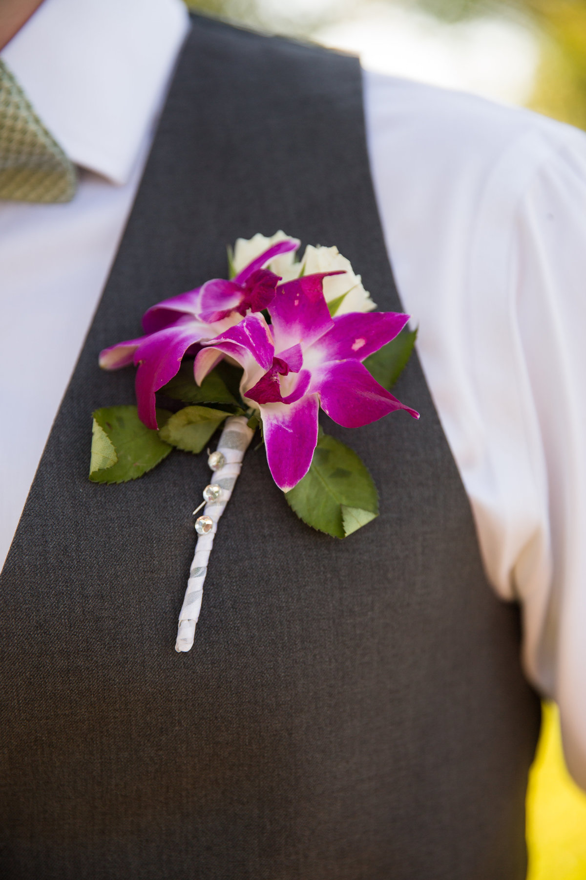 River Rock Event Center Texas Groom Boutonniere pink orchid