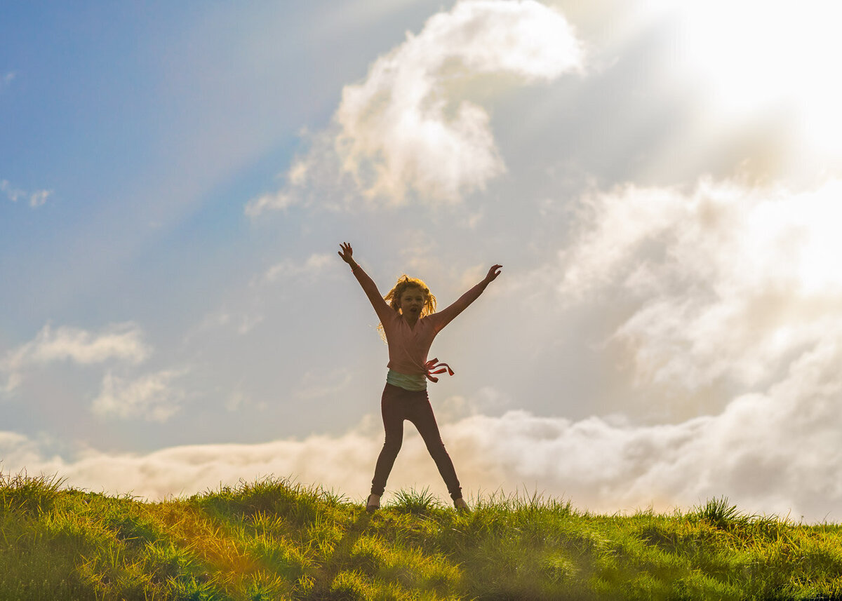 girl jumping outdoors