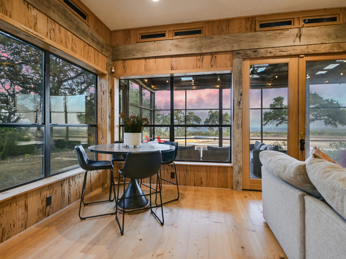 Gameroom dining area with large windows