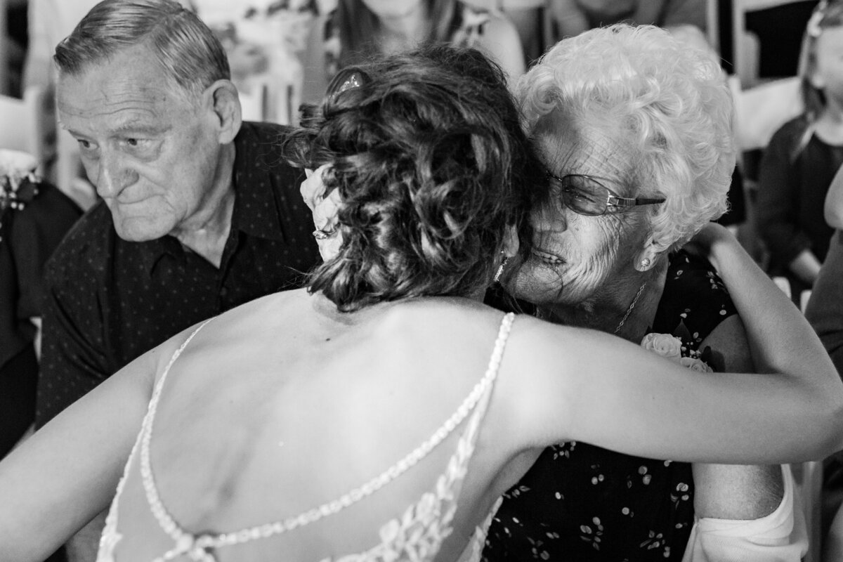 Grandma gets emotional seeing the bride during a wedding at the Ironwood in Lasalle, Illinois.
