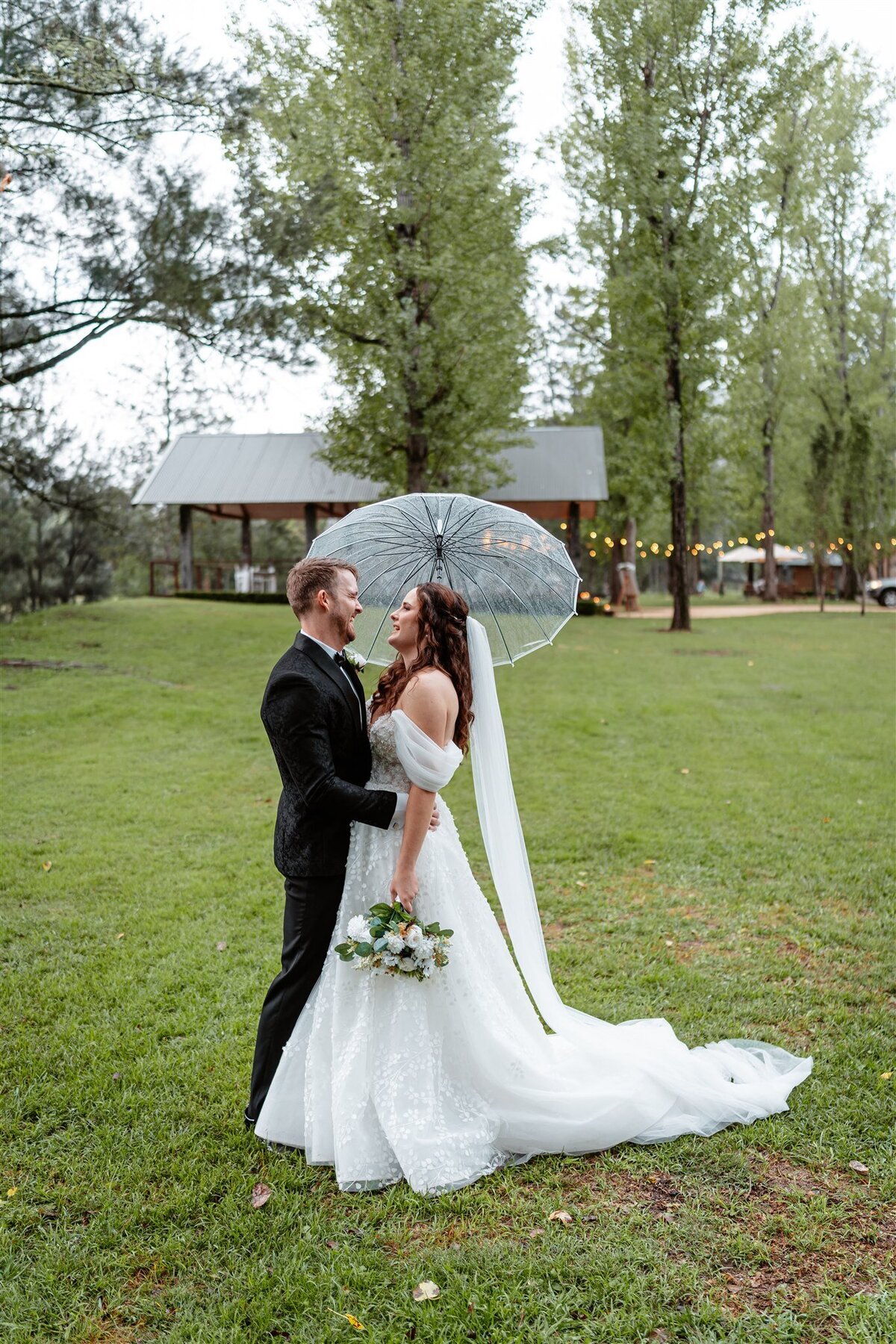 A captivating portrayal capturing the essence of love and joy as the newlyweds embark on their journey together through a timeless wedding photoshoot.