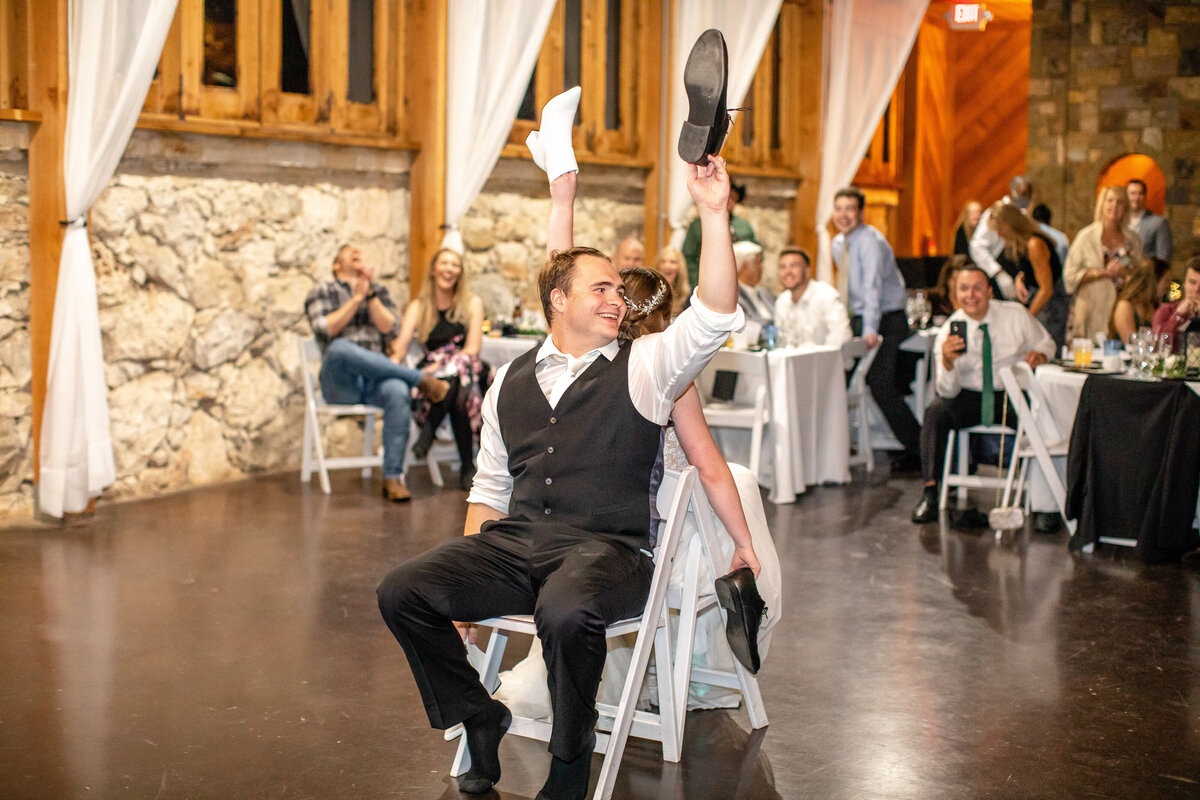 bride and groom play shoe game at Milltown Historic District