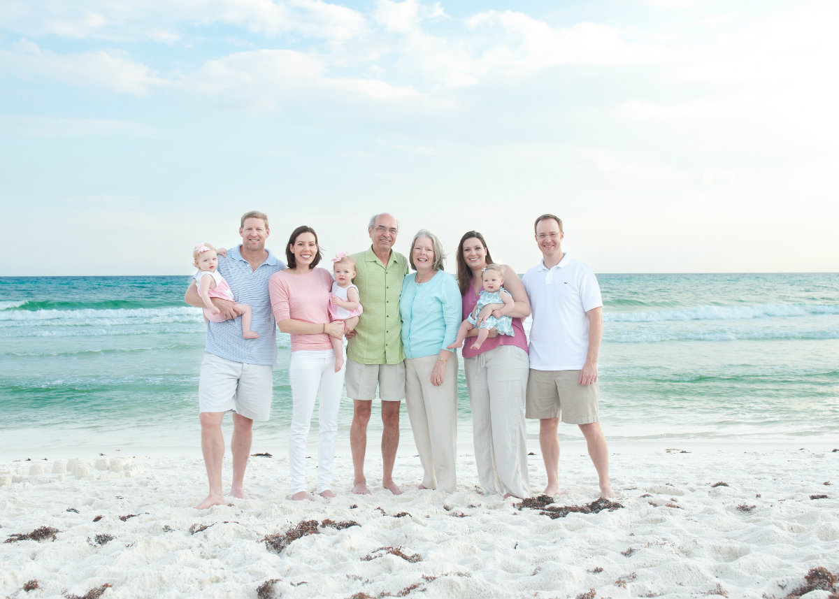 Extended family in Rosemary beach wearing pastel clothes
