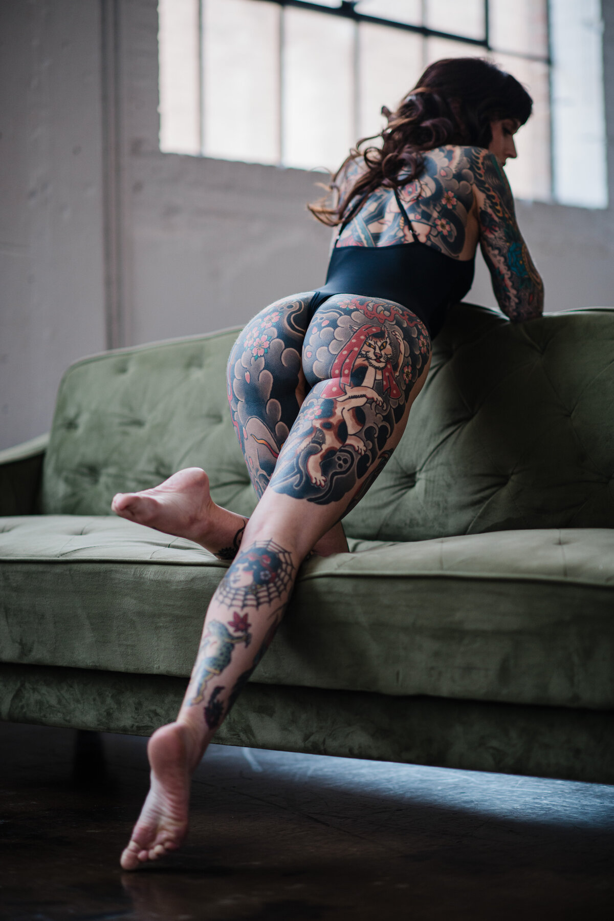 Intimate boudoir photography session featuring bold wardrobe choices in Utah