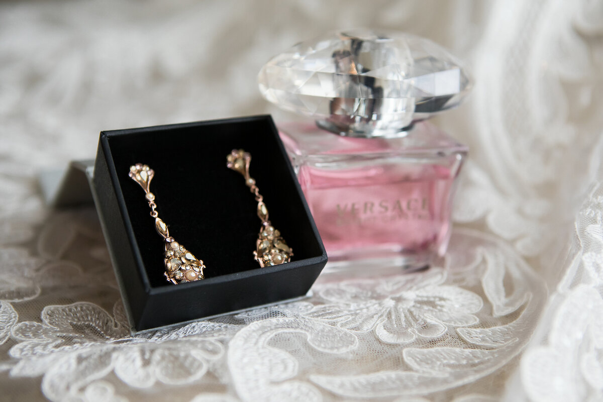 earrings and perfume