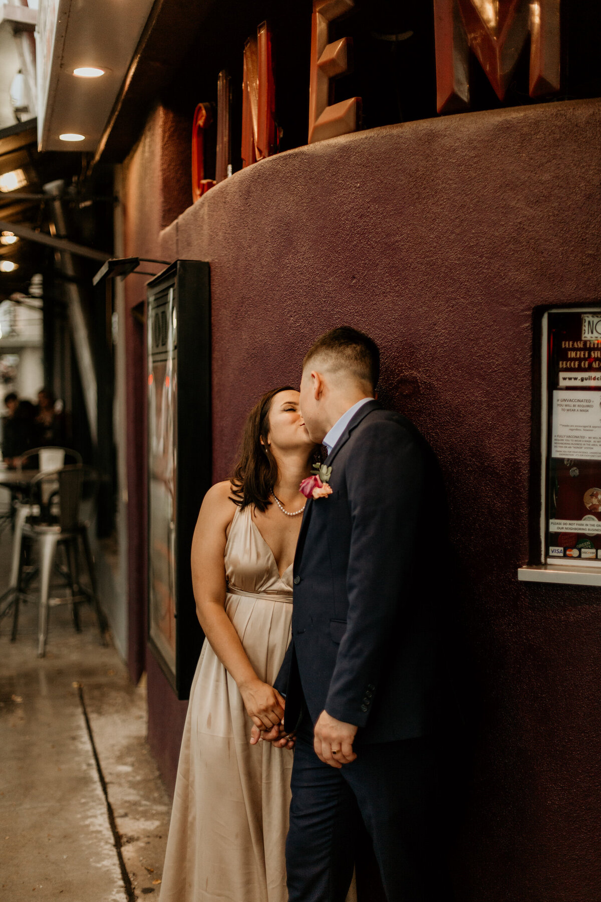 bride and groom at a retro cinema in downtown Albuquerque